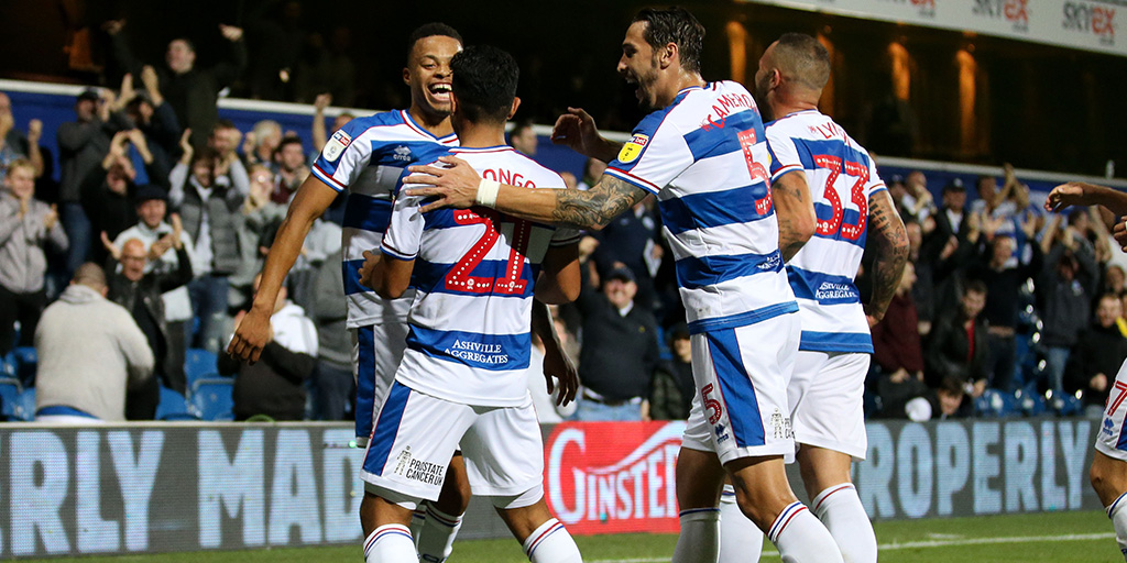 The lads celebrate with Massimo Luongo