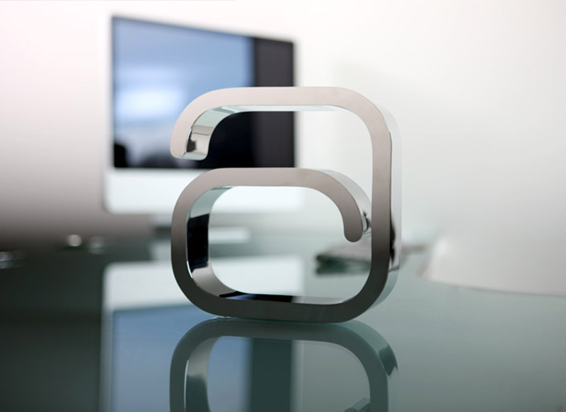 Ashville Inc A logo machined from metal